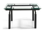 Chicyla extendable designer dining table with clear glass and black metal legs, 140 to 200cm OJAJ84316
